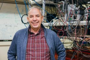 Mark Saffman standing in his lab